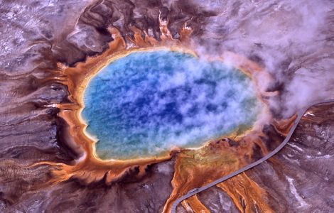 Aerial view of Grand Prismatic Spring; Hot Springs, Midway & Lower Geyser Basin, Yellowstone National Park. The spring is approximately 250 by 300 feet (75 by 91 m) in size.